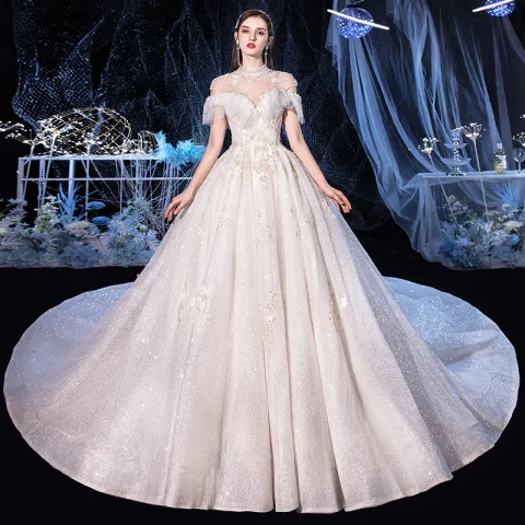 Vintage Marfil Boda Vestidos De Novia 2020 Ball Gown Cuello Alto Manga Corta Sin Espalda Apliques Con Encaje Rebordear Glitter Tul Cathedral Train Ruffle