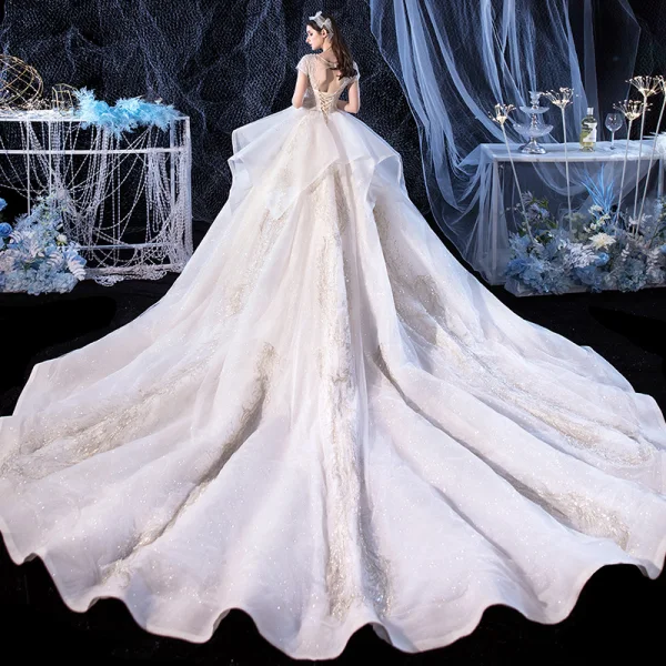Elegant Ivory Bridal Wedding Dresses 2020 Ball Gown See-through Scoop Neck Short Sleeve Backless Glitter Tulle Appliques Lace Beading Cathedral Train Cascading Ruffles