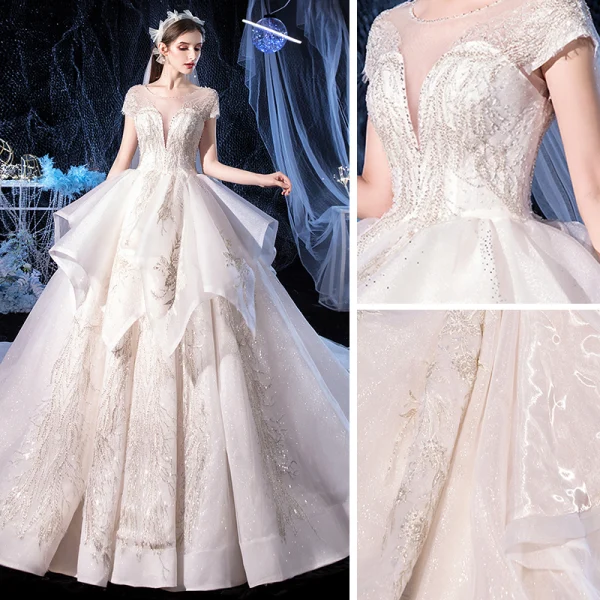 Elegant Ivory Bridal Wedding Dresses 2020 Ball Gown See-through Scoop Neck Short Sleeve Backless Glitter Tulle Appliques Lace Beading Cathedral Train Cascading Ruffles