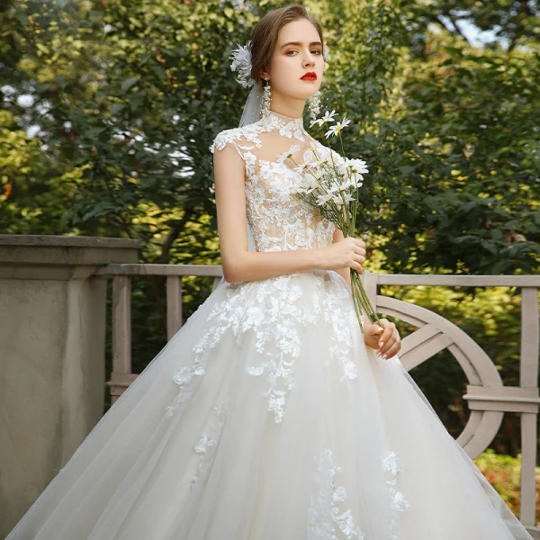 Vintage / Retro Romantic Champagne Bridal Wedding Dresses 2020 Ball Gown See-through High Neck Sleeveless Appliques Lace Chapel Train Ruffle