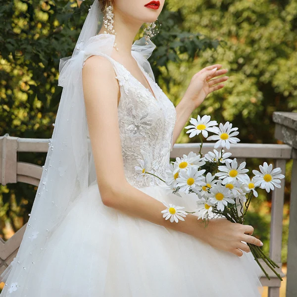 Elegant Champagne Bridal Wedding Dresses 2020 Ball Gown V-Neck Sleeveless Backless Appliques Lace Sequins Beading Cathedral Train Ruffle