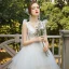 Elegant Champagne Bridal Wedding Dresses 2020 Ball Gown V-Neck Sleeveless Backless Appliques Lace Sequins Beading Cathedral Train Ruffle