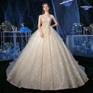Scintillantes Champagne Paillettes La Mariée Robe De Mariée 2020 Robe Boule Bretelles Spaghetti Sans Manches Dos Nu Appliques En Dentelle Perlage Glitter Tulle Royal Train Volants