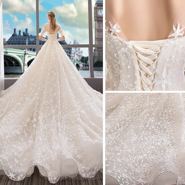 Romantique Champagne Transparentes La Mariée Robe De Mariée 2020 Princesse Encolure Dégagée Manches de cloche Dos Nu Étoile Appliques En Dentelle Perlage Perle Cathedral Train