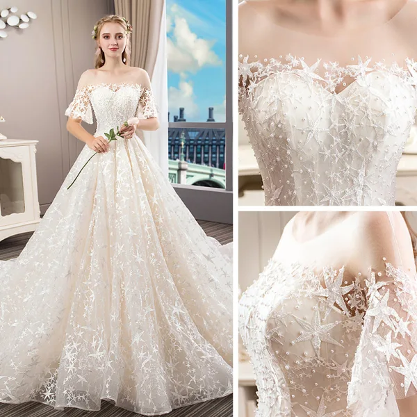 Romantique Champagne Transparentes La Mariée Robe De Mariée 2020 Princesse Encolure Dégagée Manches de cloche Dos Nu Étoile Appliques En Dentelle Perlage Perle Cathedral Train
