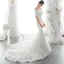 Elegant Ivory Bridal Wedding Dresses 2020 Trumpet / Mermaid Off-The-Shoulder 1/2 Sleeves Backless Appliques Lace Beading Chapel Train Ruffle