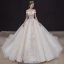 Luxe Champagne La Mariée Robe De Mariée 2020 Robe Boule De l'épaule Manches Courtes Dos Nu Appliques En Dentelle Paillettes Perlage Glitter Tulle Royal Train Volants
