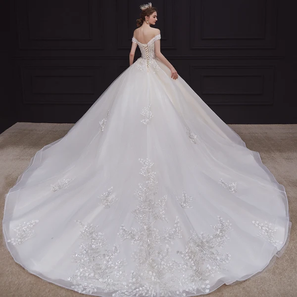 Luxe Champagne La Mariée Robe De Mariée 2020 Robe Boule De l'épaule Manches Courtes Dos Nu Appliques En Dentelle Paillettes Perlage Glitter Tulle Royal Train Volants