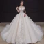 Luxe Champagne La Mariée Robe De Mariée 2020 Robe Boule De l'épaule Manches Courtes Dos Nu Appliques En Dentelle Paillettes Perlage Glitter Tulle Royal Train Volants