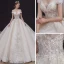 Luxe Champagne La Mariée Robe De Mariée 2020 Robe Boule De l'épaule Manches Courtes Dos Nu Appliques En Dentelle Paillettes Perlage Glitter Tulle Royal Train Volants
