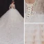 Luxe Champagne La Mariée Robe De Mariée 2020 Robe Boule Transparentes Col v profond Sans Manches Dos Nu Appliques Paillettes Perlage Royal Train Volants en Cascade