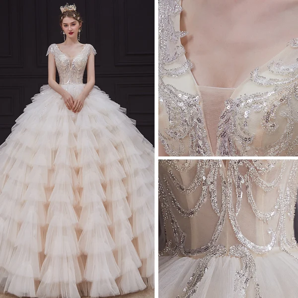 Luxe Champagne La Mariée Robe De Mariée 2020 Robe Boule Transparentes Col v profond Sans Manches Dos Nu Appliques Paillettes Perlage Royal Train Volants en Cascade