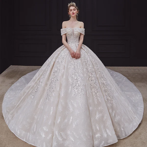Luxe Champagne La Mariée Robe De Mariée 2020 Robe Boule De l'épaule Transparentes V-Cou Manches Courtes Dos Nu Appliques Paillettes Perlage Glitter Tulle Royal Train Volants