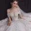 Luxe Champagne La Mariée Robe De Mariée 2020 Robe Boule De l'épaule Transparentes V-Cou Manches Courtes Dos Nu Appliques Paillettes Perlage Glitter Tulle Royal Train Volants