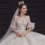 Romantisch Champagner Hochzeits Brautkleider / Hochzeitskleider 2020 Ballkleid Off Shoulder Geschwollenes 1/2 Ärmel Rückenfreies Applikationen Perlenstickerei Glanz Tülle Kapelle-Schleppe Rüschen