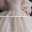 Romantisch Champagner Hochzeits Brautkleider / Hochzeitskleider 2020 Ballkleid Off Shoulder Geschwollenes 1/2 Ärmel Rückenfreies Applikationen Perlenstickerei Glanz Tülle Kapelle-Schleppe Rüschen