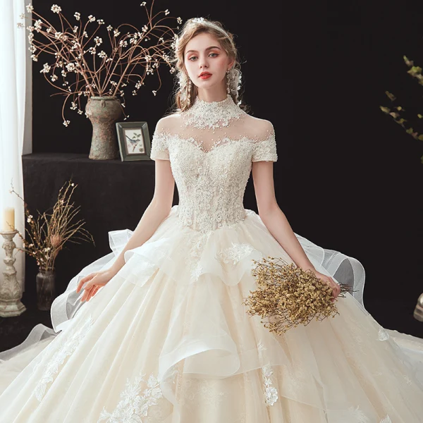 Vintage / Retro Champagne See-through Bridal Wedding Dresses 2020 Ball Gown High Neck Short Sleeve Backless Appliques Lace Beading Pearl Cathedral Train Ruffle