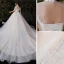 Vintage / Originale Champagne Grande Taille Robe De Mariée 2020 Robe Boule Transparentes Col Haut 1/2 Manches Dos Nu Appliques En Dentelle Glitter Tulle Cathedral Train Volants