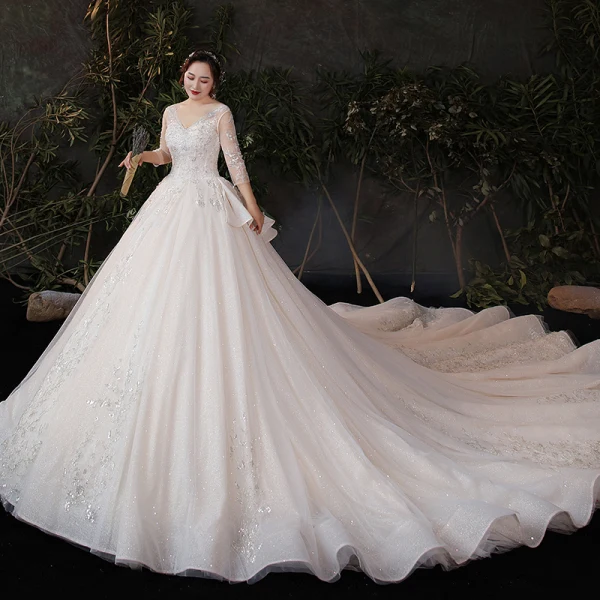 Schöne Champagner Plus Größe Brautkleider / Hochzeitskleider 2020 Ballkleid Durchsichtige V-Ausschnitt 3/4 Ärmel Rückenfreies Applikationen Pailletten Glanz Tülle Kathedrale Schleppe Rüschen