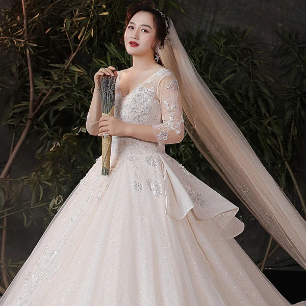 Schöne Champagner Plus Größe Brautkleider / Hochzeitskleider 2020 Ballkleid Durchsichtige V-Ausschnitt 3/4 Ärmel Rückenfreies Applikationen Pailletten Glanz Tülle Kathedrale Schleppe Rüschen