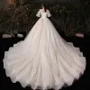 Victorian Style Champagne Plus Size Wedding Dresses 2020 Ball Gown See-through Scoop Neck Puffy 1/2 Sleeves Backless Appliques Lace Beading Glitter Tulle Cathedral Train Ruffle
