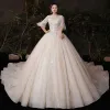 Victorian Style Champagne Plus Size Wedding Dresses 2020 Ball Gown See-through Scoop Neck Puffy 1/2 Sleeves Backless Appliques Lace Beading Glitter Tulle Cathedral Train Ruffle