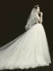 Luxury / Gorgeous Champagne See-through Bridal Wedding Dresses 2020 Ball Gown V-Neck 3/4 Sleeve Backless Handmade  Beading Glitter Tulle Chapel Train Ruffle