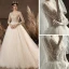 Luxury / Gorgeous Champagne See-through Bridal Wedding Dresses 2020 Ball Gown V-Neck 3/4 Sleeve Backless Handmade  Beading Glitter Tulle Chapel Train Ruffle