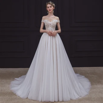 Illusion Champagne La Mariée Robe De Mariée 2020 Princesse Transparentes Encolure Dégagée Sans Manches Dos Nu Appliques En Dentelle Perlage Tribunal Train Volants