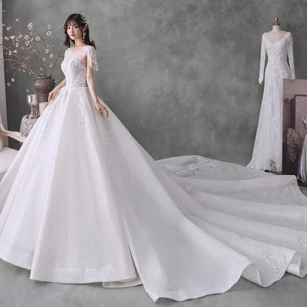 Luxe Blanche Transparentes La Mariée Robe De Mariée 2020 Robe Boule Encolure Dégagée Manches Courtes Perlage Gland Dos Nu Paillettes Glitter Tulle Cathedral Train Volants