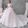 Romantic Champagne Bridal Wedding Dresses 2020 Ball Gown Off-The-Shoulder Short Sleeve Backless Beading Glitter Tulle Cathedral Train Ruffle