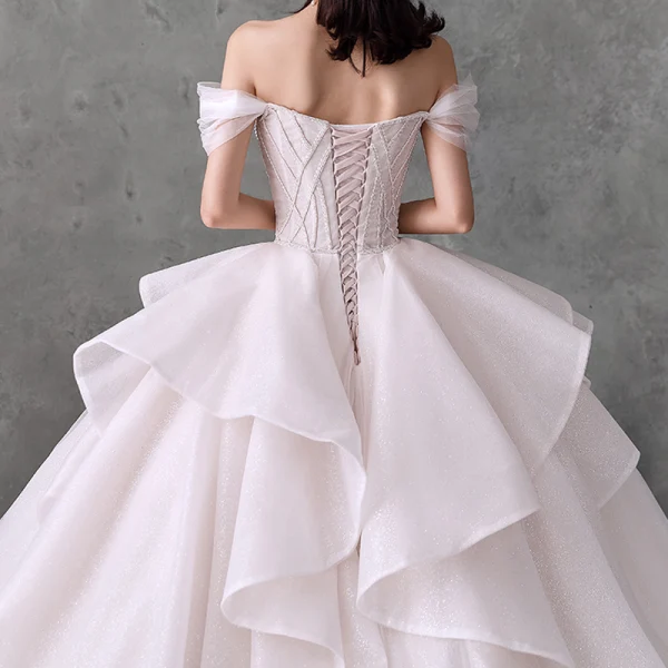 Romantic Champagne Bridal Wedding Dresses 2020 Ball Gown Off-The-Shoulder Short Sleeve Backless Beading Glitter Tulle Cathedral Train Ruffle