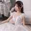 Romantique Champagne La Mariée Robe De Mariée 2020 Robe Boule Transparentes Encolure Carrée Sans Manches Dos Nu Appliques En Dentelle Perlage Glitter Tulle Royal Train