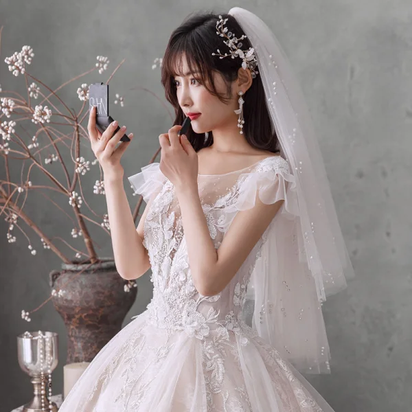 Romantique Champagne La Mariée Robe De Mariée 2020 Robe Boule Transparentes Encolure Carrée Sans Manches Dos Nu Appliques En Dentelle Perlage Glitter Tulle Royal Train