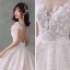Romantique Champagne La Mariée Robe De Mariée 2020 Robe Boule Transparentes Encolure Carrée Sans Manches Dos Nu Appliques En Dentelle Perlage Glitter Tulle Royal Train