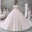 Fabulous Champagne See-through Wedding Dresses 2020 Ball Gown Scoop Neck 3/4 Sleeve Backless Appliques Lace Beading Cathedral Train Ruffle