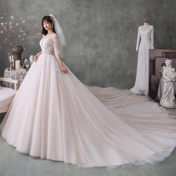 Fabulous Champagne See-through Wedding Dresses 2020 Ball Gown Scoop Neck 3/4 Sleeve Backless Appliques Lace Beading Cathedral Train Ruffle