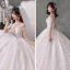 Fabulous Champagne See-through Wedding Dresses 2020 Ball Gown Scoop Neck 3/4 Sleeve Backless Appliques Lace Beading Cathedral Train Ruffle