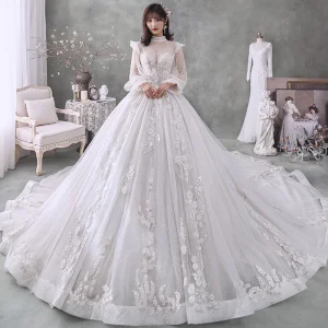 Style Victorien Ivoire La Mariée Robe De Mariée 2020 Robe Boule Transparentes Col Haut Gonflée Manches Longues Dos Nu Appliques En Dentelle Perlage Perle Glitter Tulle Cathedral Train Volants