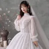 Victorian Style Ivory Bridal Wedding Dresses 2020 Ball Gown See-through High Neck Puffy Long Sleeve Backless Appliques Lace Beading Pearl Glitter Tulle Cathedral Train Ruffle