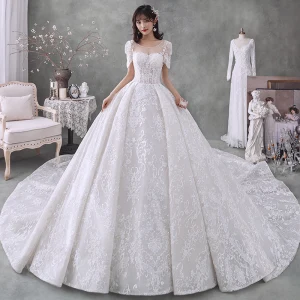 Victorian Style Ivory Bridal Wedding Dresses 2020 Ball Gown See Through Scoop Neck Puffy Short Sleeve Backless Beading Tassel Glitter Tulle Cathedral Train Ruffle