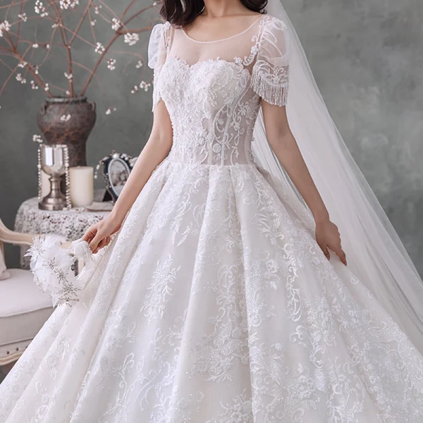 Style Victorien Ivoire La Mariée Robe De Mariée 2020 Robe Boule Transparentes Encolure Dégagée Gonflée Manches Courtes Dos Nu Perlage Gland Glitter Tulle Cathedral Train Volants
