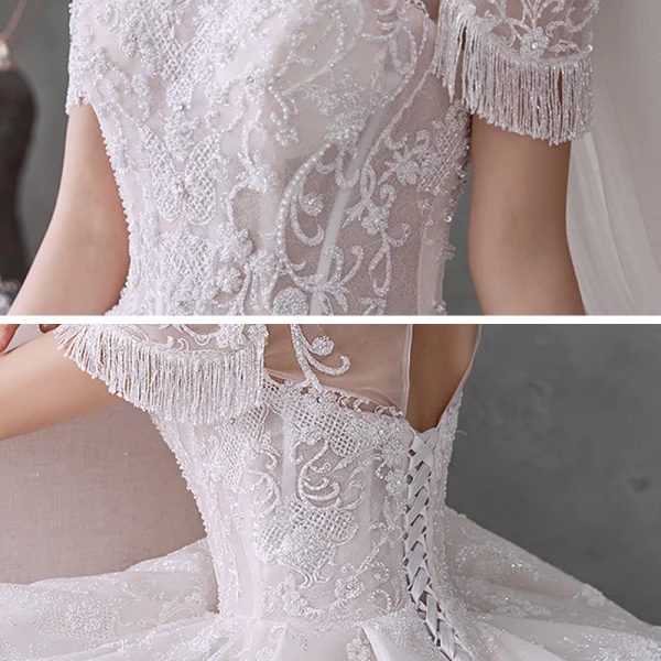 Style Victorien Ivoire La Mariée Robe De Mariée 2020 Robe Boule Transparentes Encolure Dégagée Gonflée Manches Courtes Dos Nu Perlage Gland Glitter Tulle Cathedral Train Volants