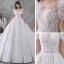Style Victorien Ivoire La Mariée Robe De Mariée 2020 Robe Boule Transparentes Encolure Dégagée Gonflée Manches Courtes Dos Nu Perlage Gland Glitter Tulle Cathedral Train Volants