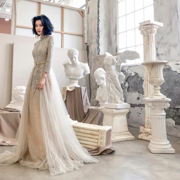 High End Champagne See Through Evening Dresses 2020 A Line Princess High Neck Long Sleeve Appliques Lace Beading Sash Sweep Train Ruffle Formal Dresses
