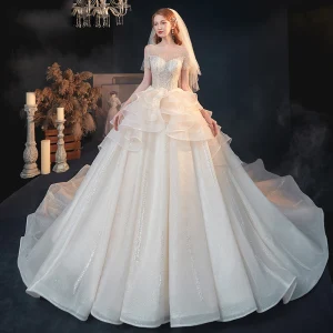 Luxe Champagne Transparentes La Mariée Robe De Mariée 2020 Princesse Encolure Dégagée Manches Courtes Dos Nu Perlage Paillettes Glitter Tulle Cathedral Train Volants