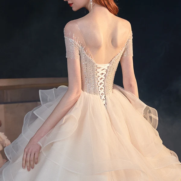 Luxe Champagne Transparentes La Mariée Robe De Mariée 2020 Princesse Encolure Dégagée Manches Courtes Dos Nu Perlage Paillettes Glitter Tulle Cathedral Train Volants