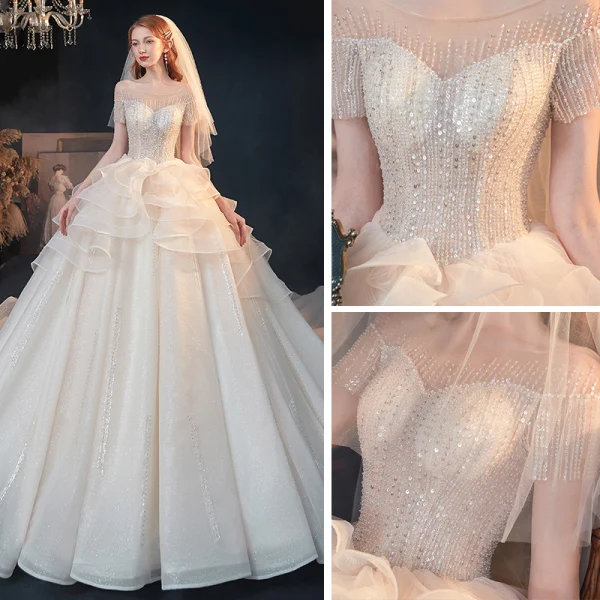 Luxe Champagne Transparentes La Mariée Robe De Mariée 2020 Princesse Encolure Dégagée Manches Courtes Dos Nu Perlage Paillettes Glitter Tulle Cathedral Train Volants