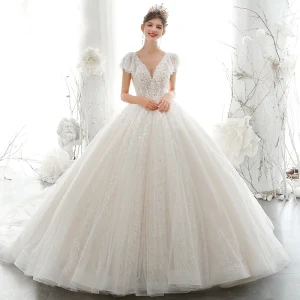 Luxury Gorgeous Champagne Bridal Wedding Dresses 2020 Ball Gown See Through V Neck Short Sleeve Backless Appliques Sequins Beading Cathedral Train Ruffle