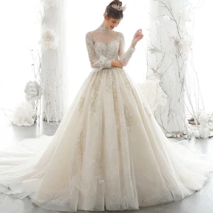 Viktorianischer Stil Champagner Durchsichtige Brautkleider Hochzeitskleider 2020 Ballkleid Stehkragen Geschwollenes Lange Ärmel Rückenfreies Applikationen Spitze Pailletten Handgefertigt Perlenstickerei Perle Kapelle Schleppe Rüschen